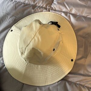Ladies sunshade wide rimmed hat with an opening for your ponytail